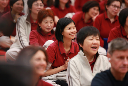 A group of students enjoying a meditation course