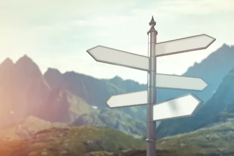 Road sign of unknowns, seeking for guidance and direction in life.