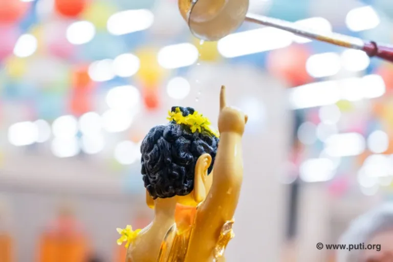 Pouring pure water over the Buddha statue expresses reverence and blessings