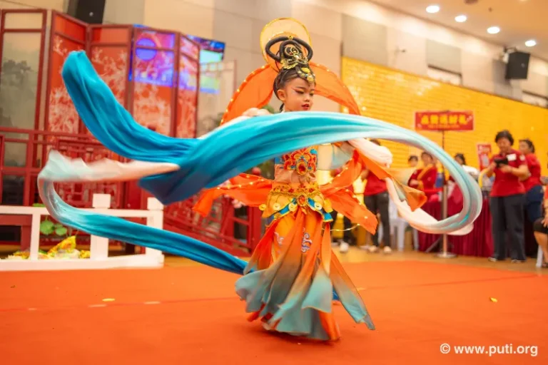 Children in colorful outfits performed traditional dances