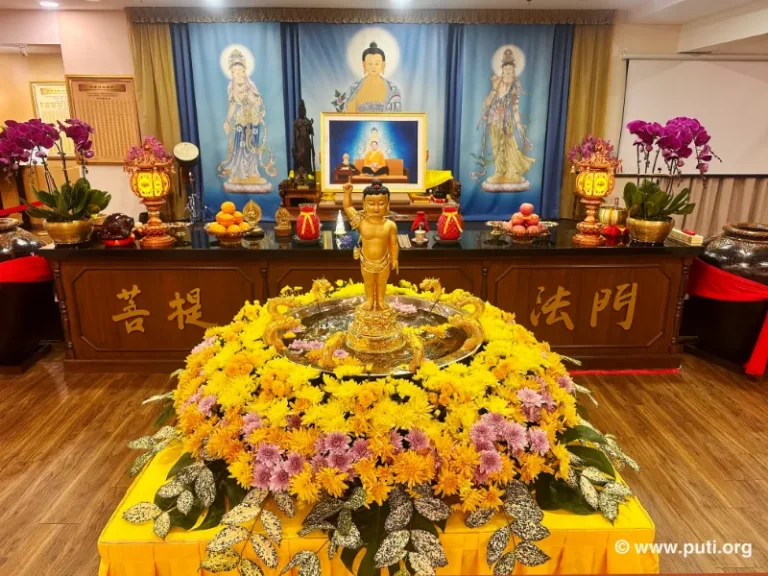The golden-glowing statue of Prince Siddhartha symbolizes wisdom and compassion