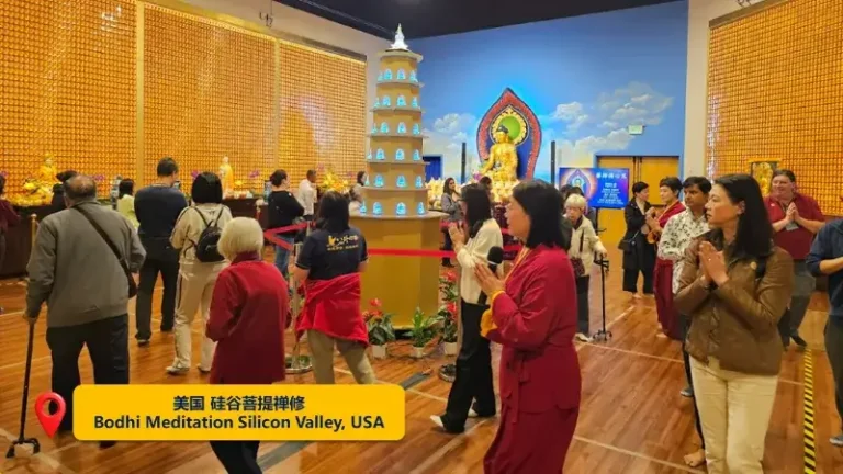 Devotees in the Silicon Valley Bodhi Meditation Center circumbulate the Buddha for blessings.